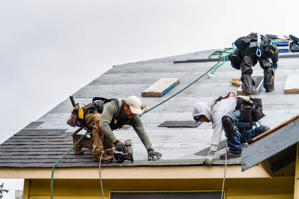 Professional Emergency Roof Repair technician working in Laurinburg, NC